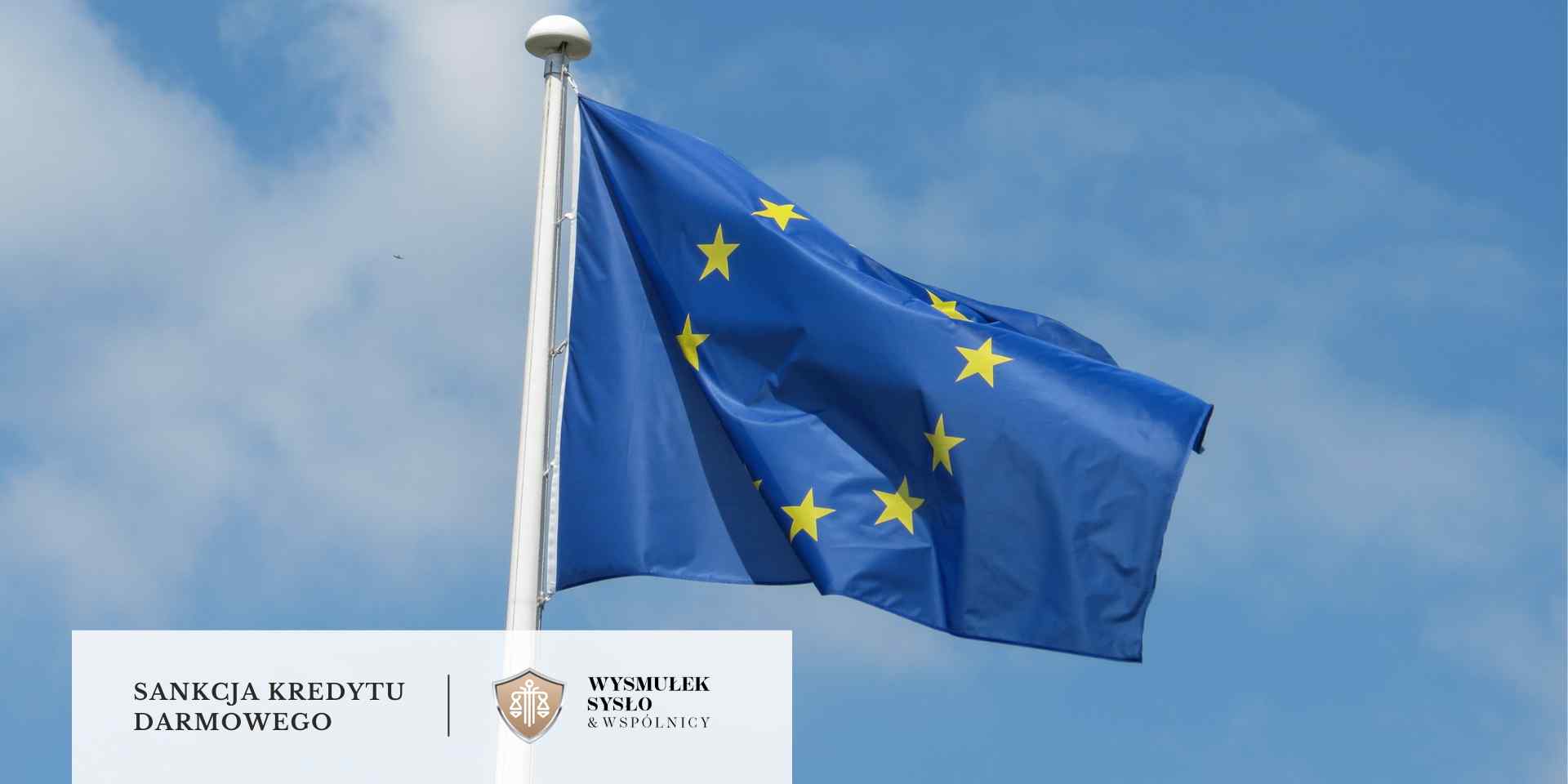 Flaga Unii Europejskiej z dwunastoma żółtymi gwiazdami na niebieskim tle, powiewa na maszcie pod błękitnym niebem